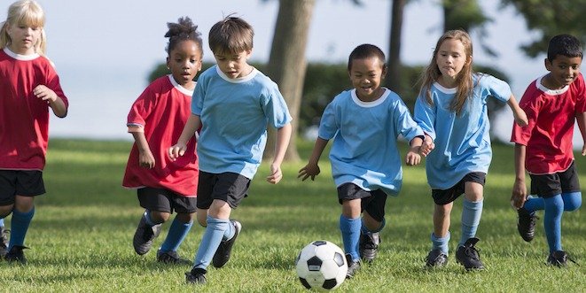 Little Boy Kicking a Soccer Ball type 1 diabetes physical activity