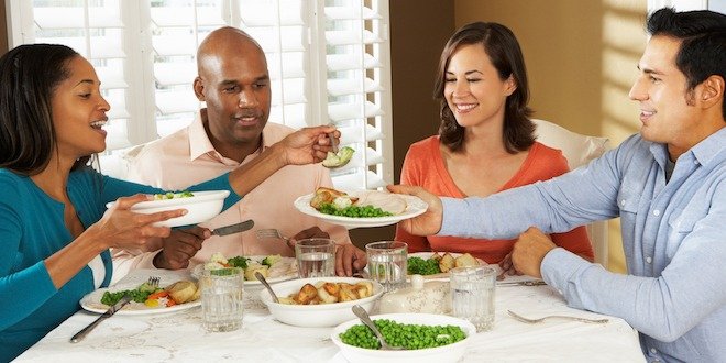 Group Of Friends Enjoying Meal At Home