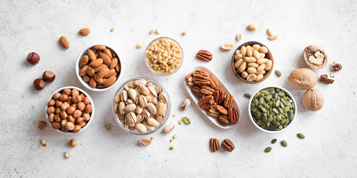 Various Nuts in bowls nuts
