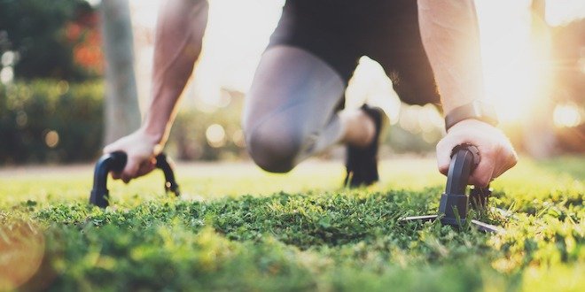 Healthy lifestyle concept.Male athlete exercising push up outside in sunny park. Fit shirtless male fitness model in exercise outdoors.Sport fitness man doing push-ups. high intensity exercise and blood sugar levels