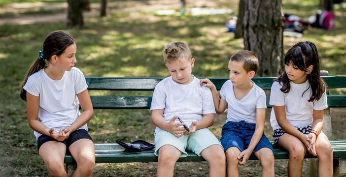 school boy testing, friends support